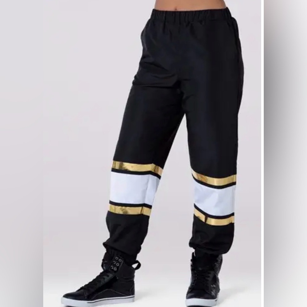 Black Pants With White and Gold Accents